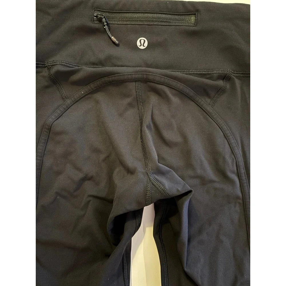 Lululemon Women's Black Crop Leggings Back Zip Pocket  Mesh Panel Running size 4